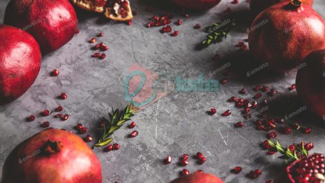 دانلود عکس انار روی زمینه خاکستری