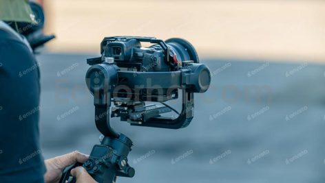 دانلود عکس فیلمبردار با دوربین و گیمبال