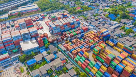 Shipping container site loading in logistic port warehouse storage business import and export goods