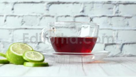 Close Up of Lemon Tea on Wooden Background