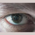 Male Eye Zoom to Computer Chip