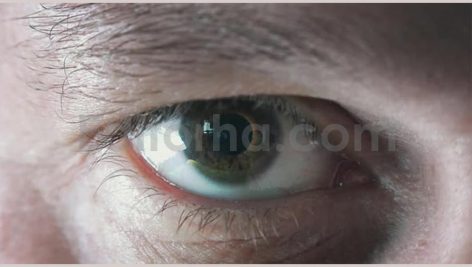 Male Eye Zoom to Computer Chip