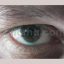 Male Eye Zoom to Computer Chip