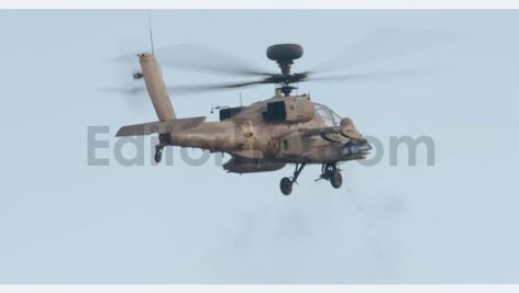 Military helicopter in combat flight
