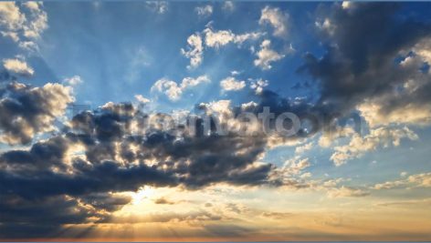 Sunset Skylapse Over Coastal Skyline With Moving Clouds