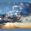 Sunset Skylapse Over Coastal Skyline With Moving Clouds