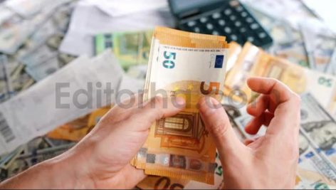 Man Calculating Money Monthly Home Expenses Taxes and Bank Account Balance